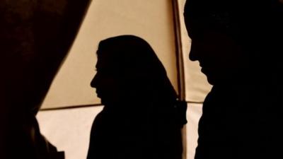 Yazidi women in silhouette