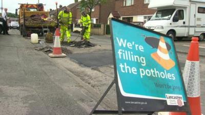 Men working on repairing a road