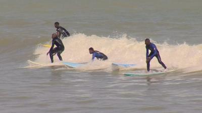 People surfing