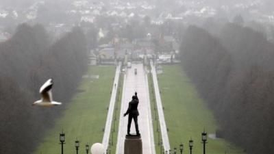 A statue of 1920"s Ulster Unionist politician Edward Carson overlooks the grounds of Stormont estate, near Belfast Tuesday, Dec. 23, 2014