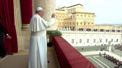 Pope Francis on the balcony overlooking St Peter's Square