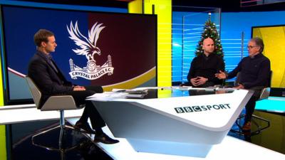 Football Focus presenter Dan Walker with pundits John Hartson and Mark Lawrenson (L-R)