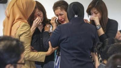 Relatives at Surabaya's international airport in Indonesia (29 Dec 2014)