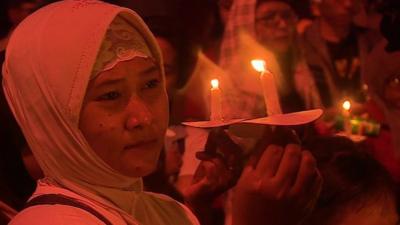 Woman holding candle