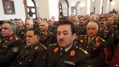 Afghan security forces listening to speech