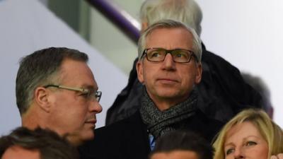 Prospective Crystal Palace boss Alan Pardew watches from the stands at Villa Park.