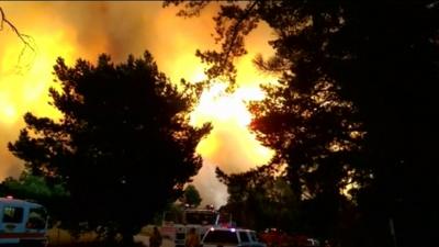 Wildfires light up the sky