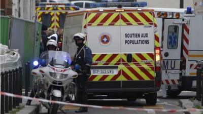 Police block road at Charlie Hebdo offices