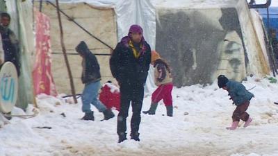 Syrian refugees in snow