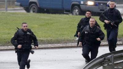 Members of the French gendarmerie intervention forces arrive in Dammartin-en-Goele