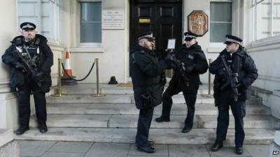 Armed police outside the French Embassy in London