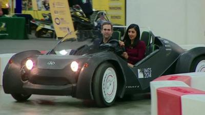 Samira Hussain test-driving Local Motors' 3D-printed Strati