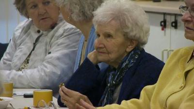 An elderly woman at a care home in Leeds