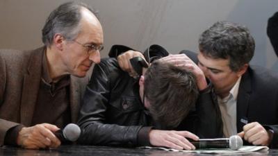 (Left-right) Editor-in-chief of Charlie Hebdo Gerard Biard, cartoonist Renald 'Luz' Luzier and columnist Patrick Pelloux