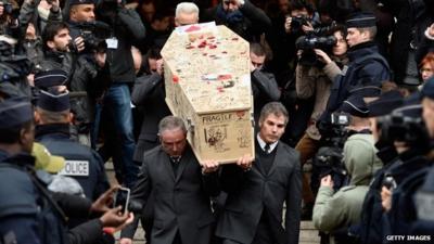 The coffin of Bernard Verlhac - known as Tignous