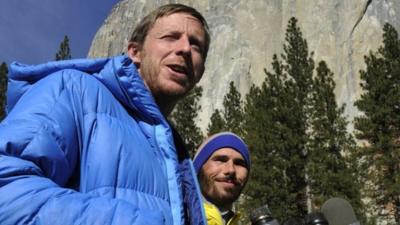 Climbers Tommy Caldwell, left, and Kevin Jorgeson, right, speak during a press conference in Yosemite Valley near the base of El Capitan