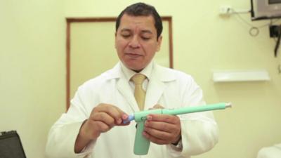 Doctor demonstrates the cryopen