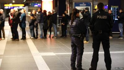 Police officers at the main Hauptbahnhof railway station in Berlin on 17 January 2015