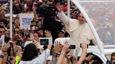 Pope waving to crowds