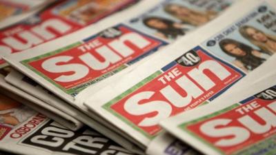 Copies of the Sun newspaper