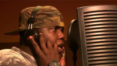 Ambwene Yessayah rapping Bongo Flava in the studio
