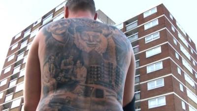 Darren Williams' tattooed back