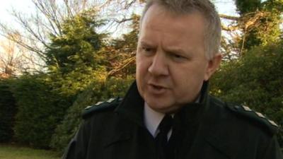 PSNI Chief Inspector Alan Hutton told BBC News NI's Keiron Tourish a wooden cross was left in place of the statue