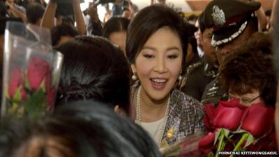 Yingluck Shinawatra greeted by supporters as she arrives for impeachment hearing