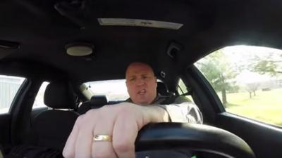 Screenshot of a YouTube video of Dover police official's Taylor Swift lip-sync video