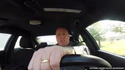 Screenshot of a YouTube video of Dover police official's Taylor Swift lip-sync video