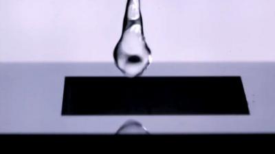 Water "bounces" or slides away when it hits the new metalic substance