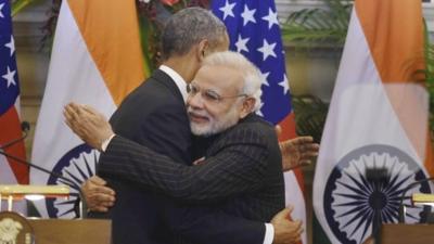 President Barack Obama, left and Indian Prime Minister Narendra Modi hug after they jointly addressed the media following their talks, in New Delhi, India, Sunday, Jan. 25, 2015