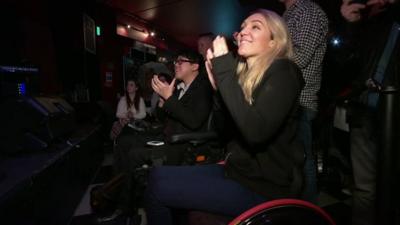 Wheelchair users at a gig in London