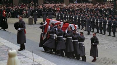 The pallbearers on the steps of St Paul's Cathedral