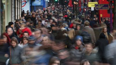 Crowds of people on Oxford Street, London