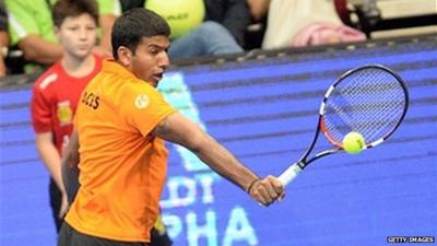 Rohan Bopanna, Indian tennis professional, returns a shot