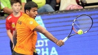 Rohan Bopanna, Indian tennis professional, returns a shot