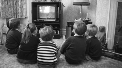 Children watching TV