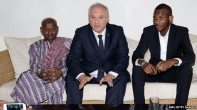 Lassana Bathily"s father, France's ambassador to Mali, Gilles Huberson, and Lassana Bathily