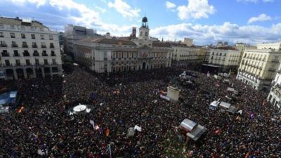 Thousands gather at a rally in Madrid planned by left-wing party Podemos