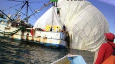 Screen grab shows the recovery boats collecting the Two Eagles balloon 4 miles offshore in Baja California