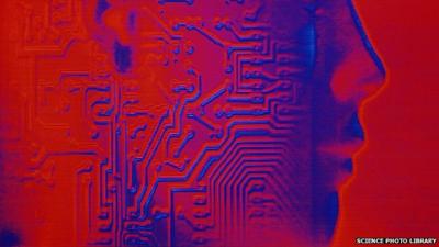 An artwork of a circuit board and a human head