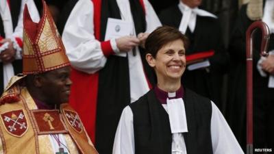 The first female bishop in the Church of England, Libby Lane, steps outside following her consecration service at York Minster