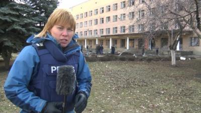 The BBC's Olga Ivshina outside the hospital in Donetsk