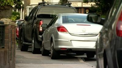 Parked cars on pavements