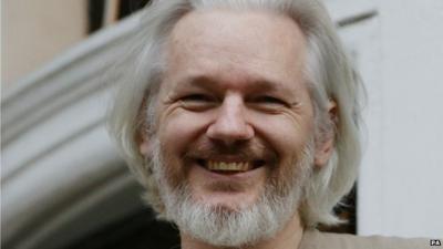 File photo dated 25/11/14 of Julian Assange on the balcony of the Ecuadorian embassy in London