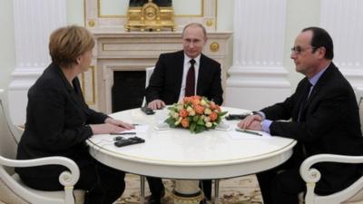 German Chancellor Angela Merkel (L), Russia"s President Vladimir Putin (C) and French President Francois Hollande attend a meeting on resolving the Ukraine crisis at the Kremlin in Moscow