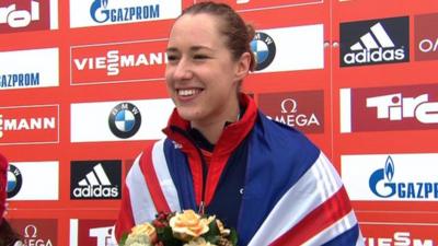 Lizzie Yarnold on the podium