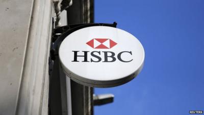 HSBC sign is seen outside a bank branch in London