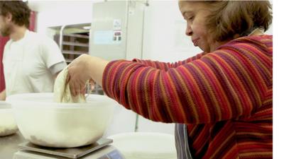 Serena working at the bakery